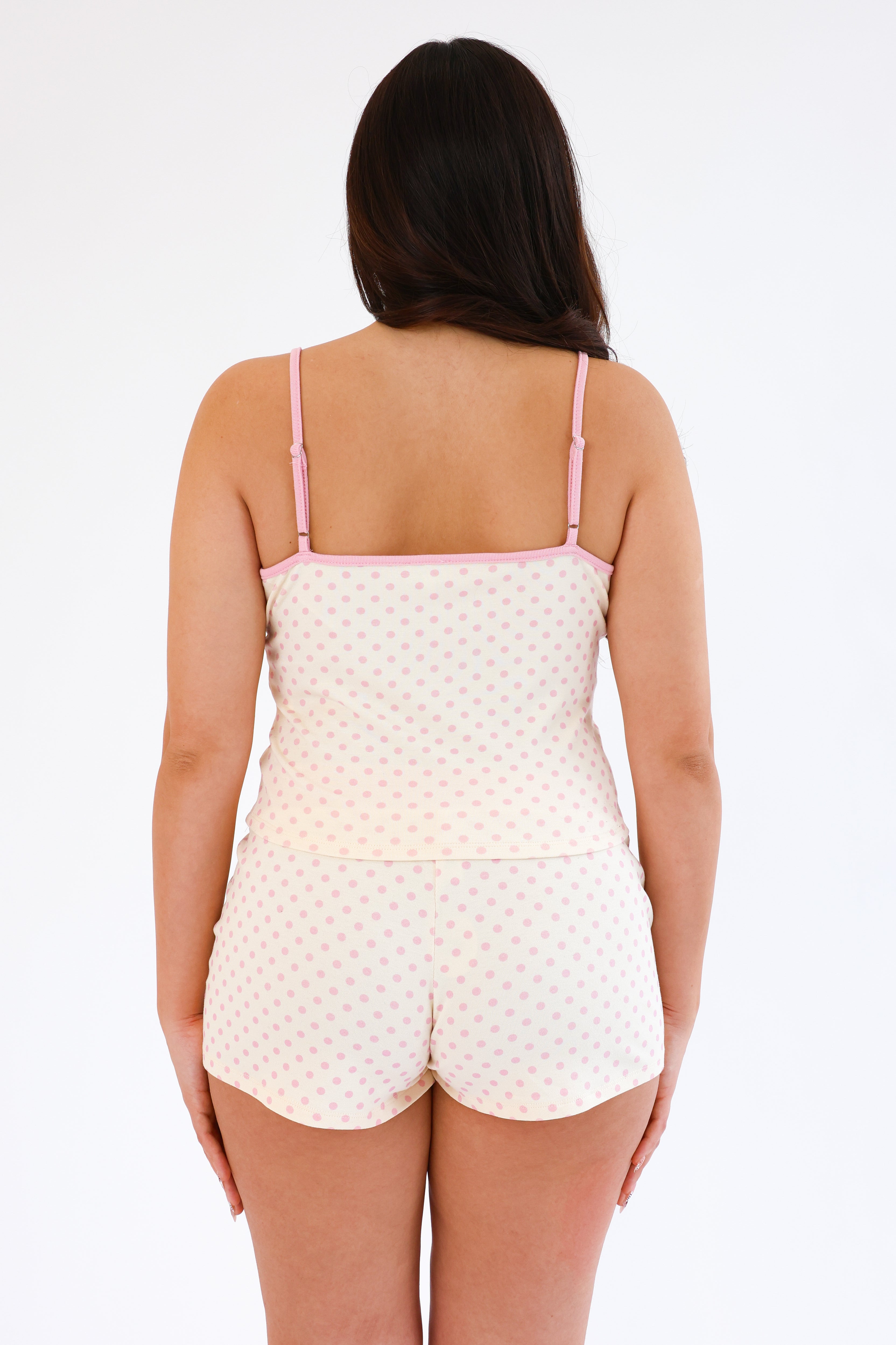 cream tank and shorts with pink polka dots on it PJS